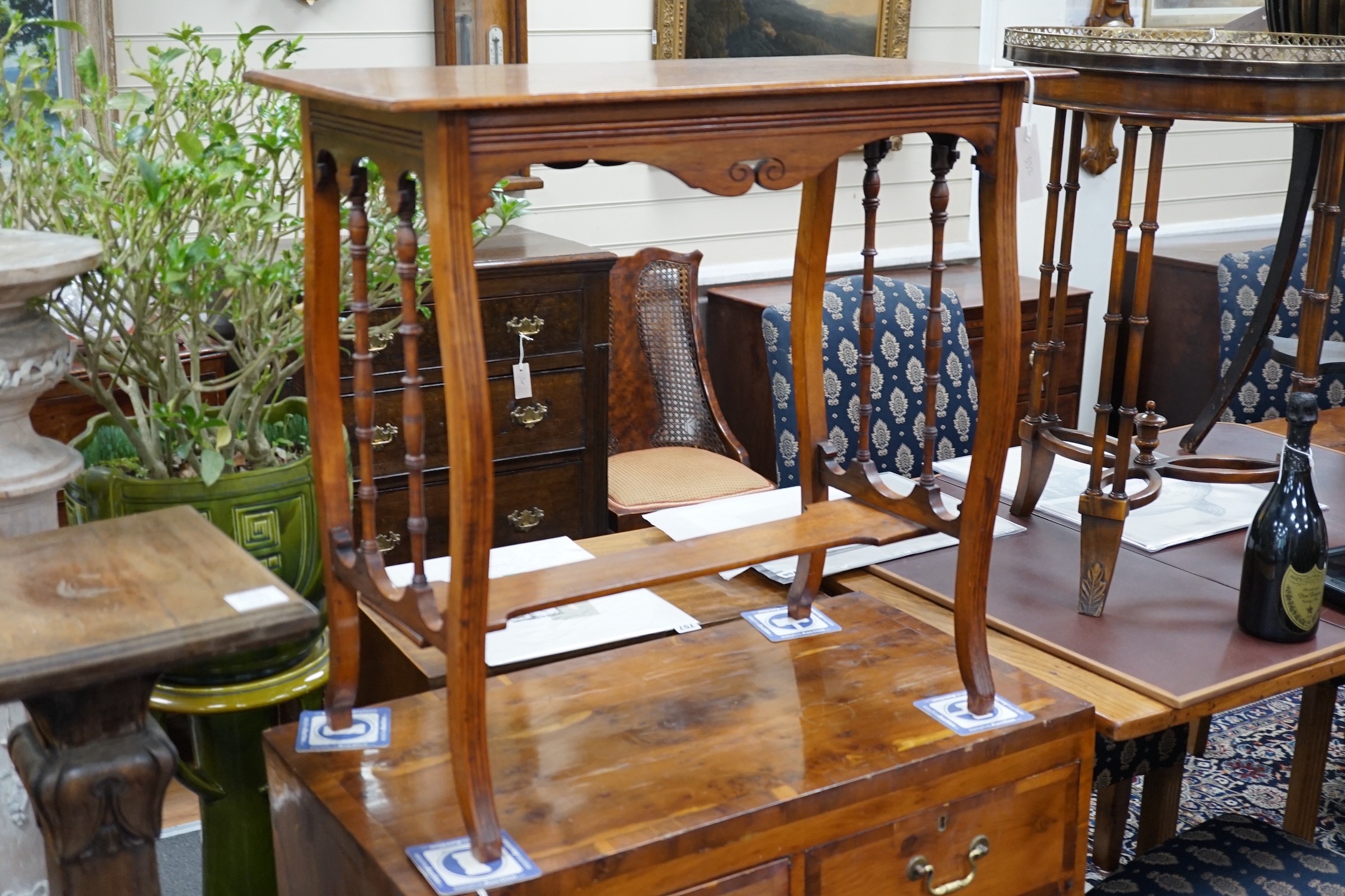 An Edwardian walnut occasional table, width 70cm *Please note the sale commences at 9am.